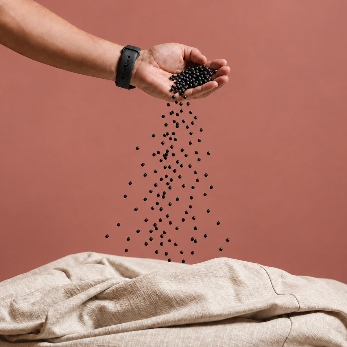 Pouring Fill Co Black beans from one hand into an oatmeal cover