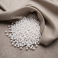 Fill Co White beans spilling from an oatmeal cloth onto stone