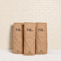 Fill Co White paper bags, 50 L and 100 L, standing in White beans