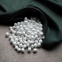 Envee beans on green cloth