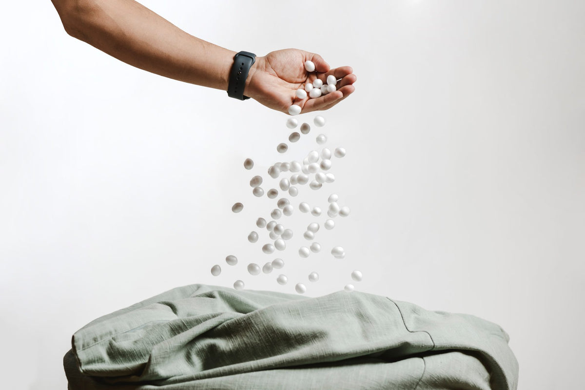 Fill Co bean bag beans pouring into a cover